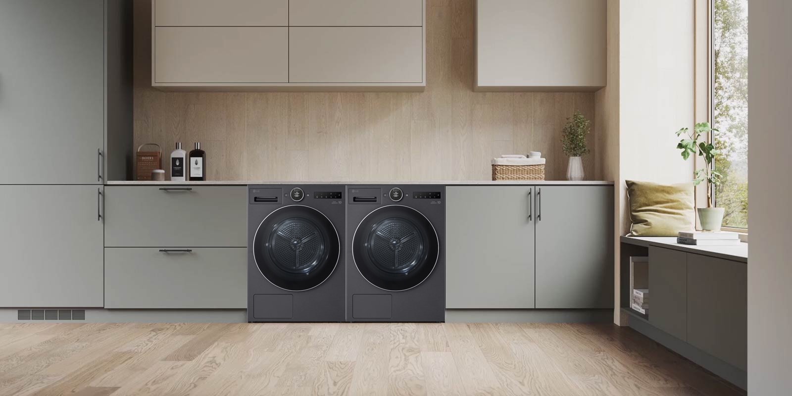 配有 LG 洗衣机的洗衣房里的 LG 烘干机的拉近视角视频