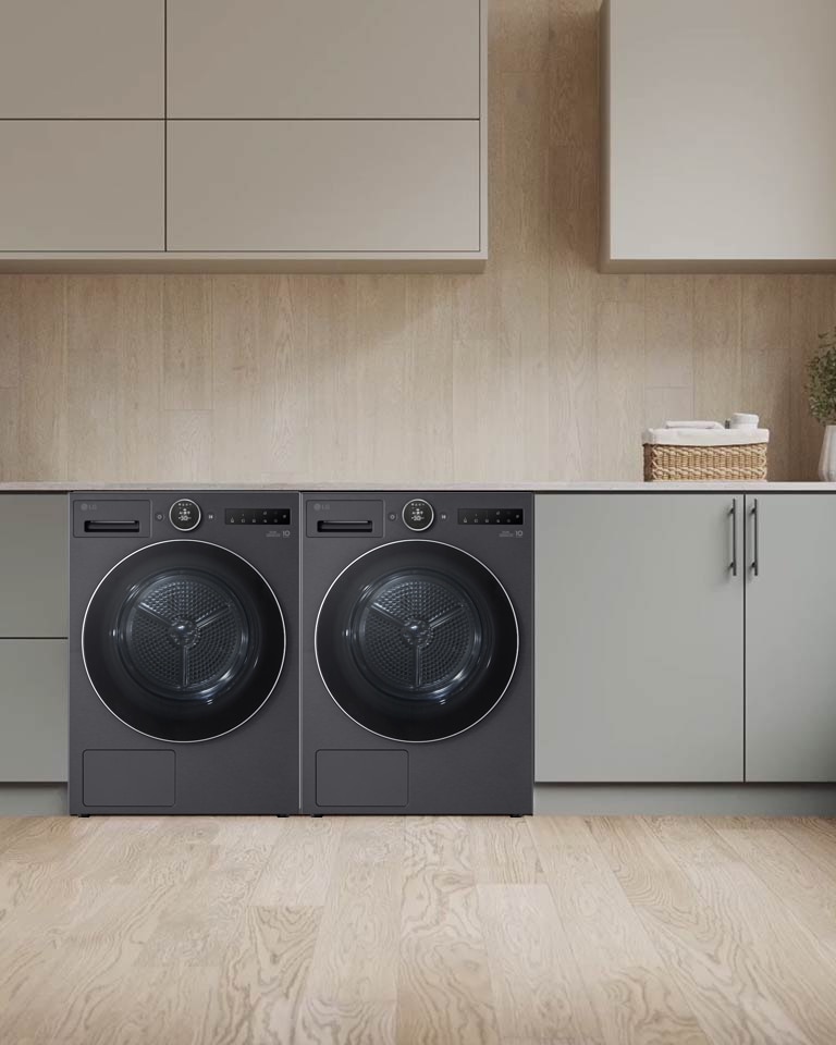 配有 LG 洗衣机的洗衣房里的 LG 烘干机的拉近视角视频