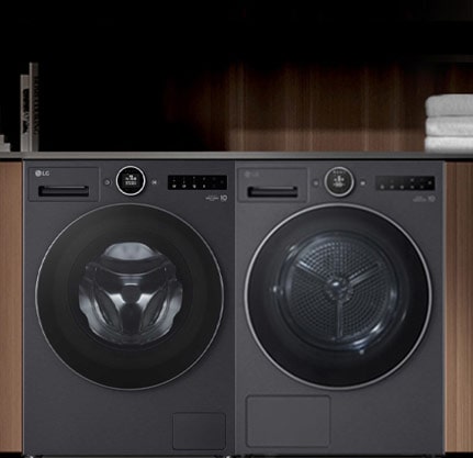 洗衣机和烘干机在室内并排放置的图像。