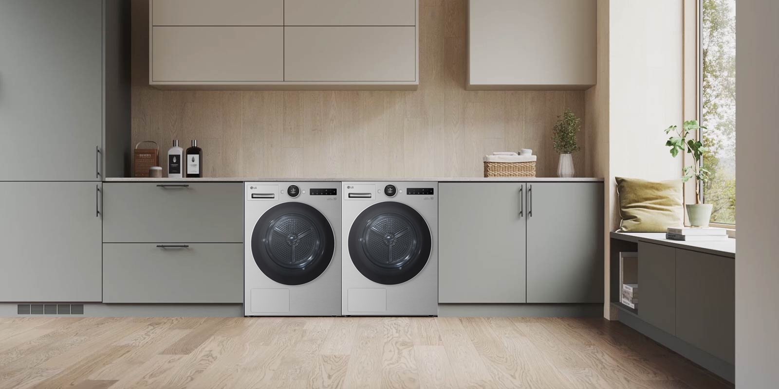 配有 LG 洗衣机的洗衣房里的 LG 烘干机的拉近视角视频