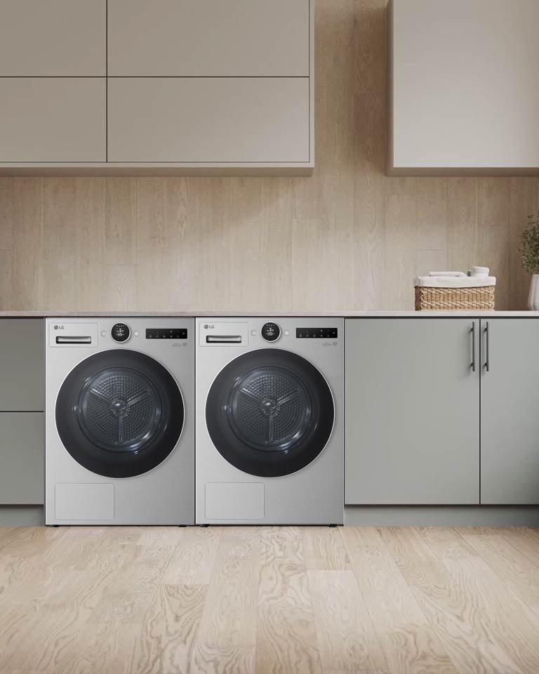 配有 LG 洗衣机的洗衣房里的 LG 烘干机的拉近视角视频