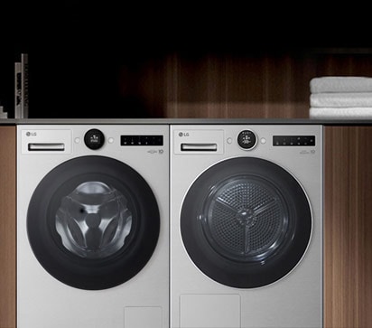 洗衣机和烘干机在室内并排放置的图像。