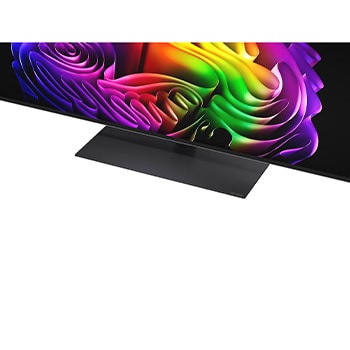 LG OLED evo AI G6 avec Brightness Booster Ultra montre une scène sombre où une silhouette de baleine lumineuse se démarque au milieu de particules éclatantes, offrant une luminance 3,9 fois plus lumineuse avec des détails plus clairs.