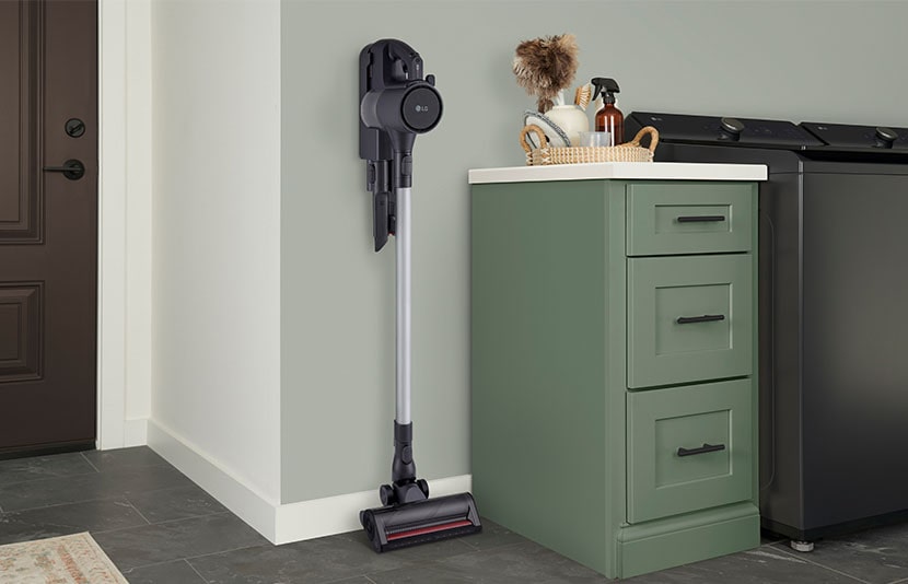 LG CordZero® Q3 Cordless Stick Vacuum with the charging dock on the wall.