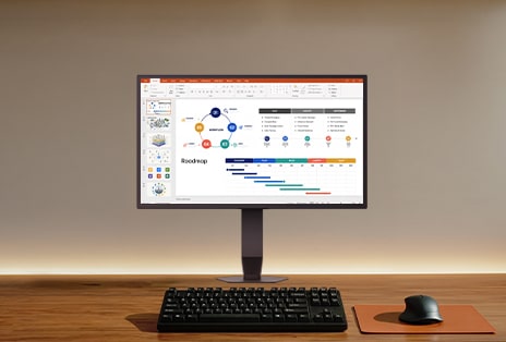 A 25 to 27-inch LG UltraGear monitor on a desk displays a presentation document, highlighting its suitability for general office work.