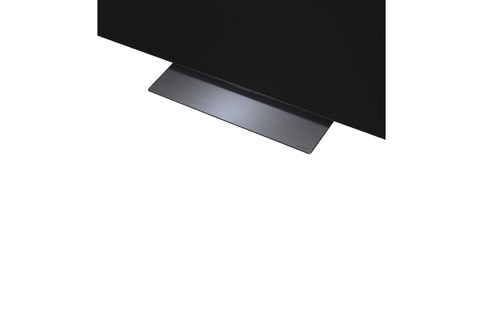 LG OLED evo AI C6 with Brightness Booster Pro shows a dark scene where glowing particles surrounding a deer silhouette, delivering up to 3.2x brighter peak brightness with higher luminance and clearer detail.