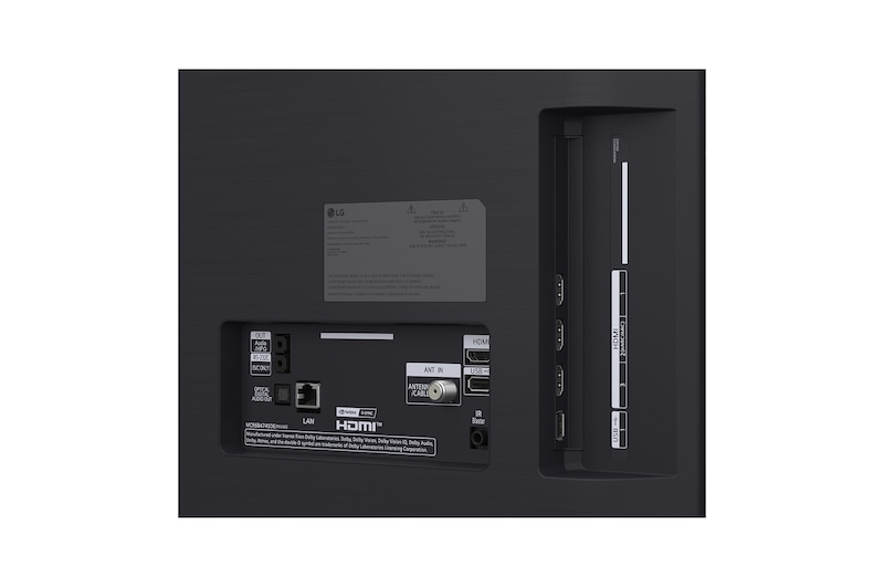 The front view of LG OLED evo AI C6, released in 2026, features a slim black bezel, with a vivid, sculpted swirl of layered rainbow tones flowing across the screen.