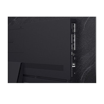 LG OLED evo AI C6 shows a split-screen planet-and-stars scene, comparing an anti-glare matte display with its Perfect Black & Perfect Color display for clearer picture quality in any light, supported by UL certification and Intertek certifications for color volume and color fidelity.