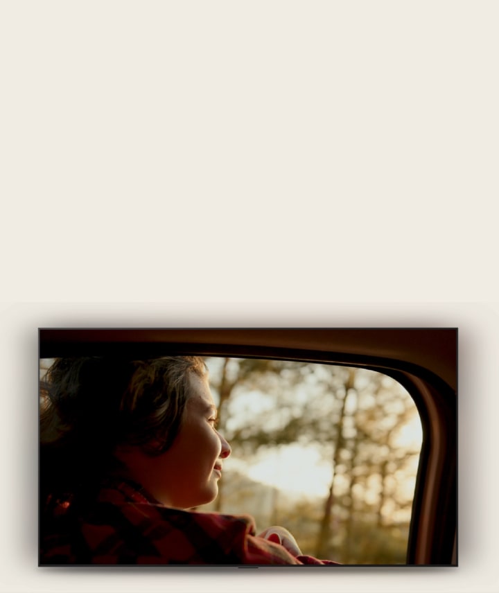 LG OLED evo AI W6 Wallpaper TV shows a drama scene of a person riding in a car, then a Sports Alert for a live soccer match pops up with real-time scores and, when tapped, switches straight to the live game.