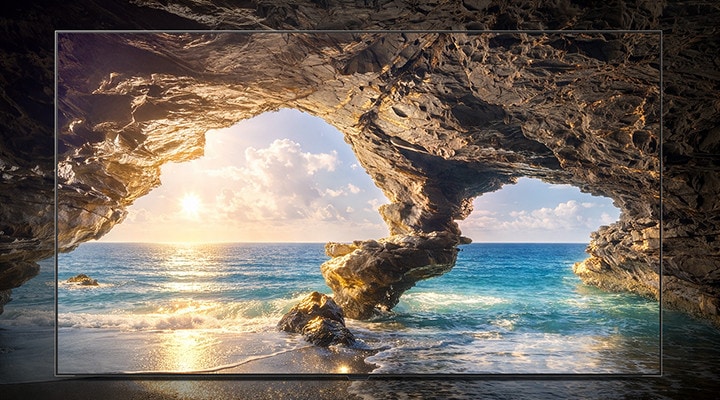 LG OLED evo AI W6 Wallpaper TV with Visually Lossless performance displays a sunlit ocean cave scene in 4K 165Hz, preserving fine detail, natural color, and smooth motion wirelessly.
