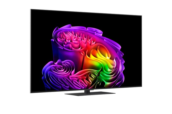 Das LG OLED evo AI G6 zeigt eine lebendige Sonnenuntergangsszene über dem Ozean, mit einer Soundbar und einem Lautsprecher unter dem Bildschirm, die einen ruhigen und stimmungsvollen Wohnbereich aufwerten.
