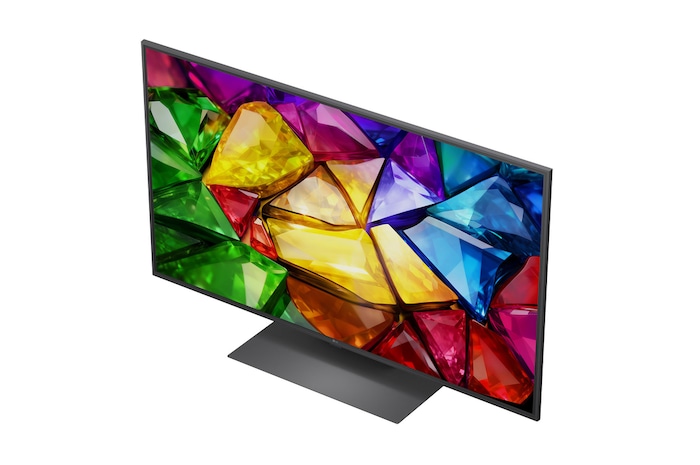 Der LG Mini RGB evo AI MRGB86 ist in einem geräumigen, modernen Wohnbereich an der Wand montiert und zeigt ein lebendiges abstraktes Kunstwerk mit wirbelnden, bunten Elementen.