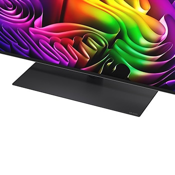 Der LG OLED evo AI G6 zeigt eine lebendige Sonnenuntergangsszene über dem Ozean, mit einer Soundbar und einem Lautsprecher unter dem Bildschirm, die einen ruhigen und stimmungsvollen Wohnbereich aufwerten.