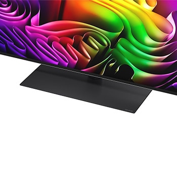 Der LG OLED evo AI G6 zeigt eine lebendige Sonnenuntergangsszene über dem Ozean, mit einer Soundbar und einem Lautsprecher unter dem Bildschirm, die einen ruhigen und stimmungsvollen Wohnbereich aufwerten.