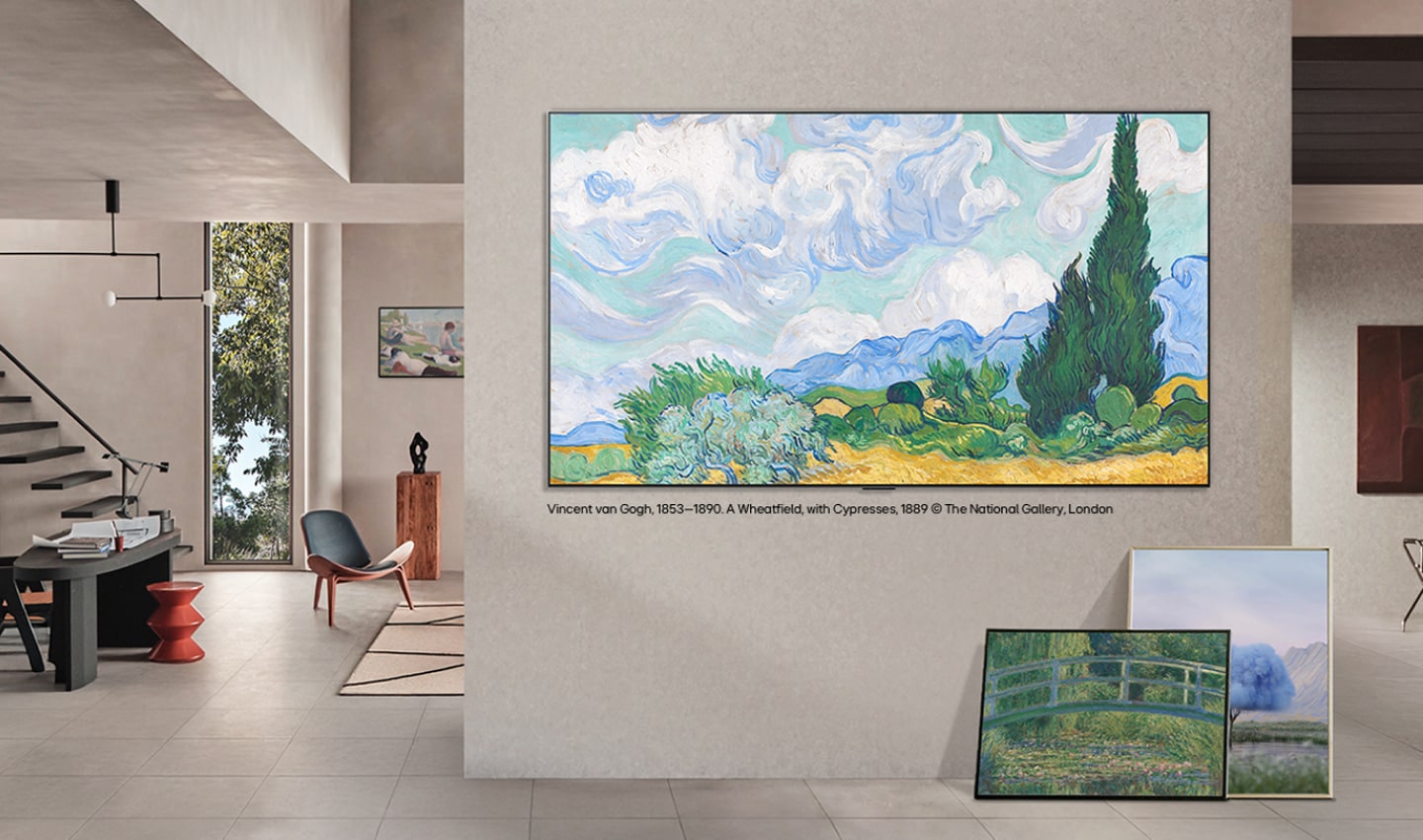 LG Gallery+ med varieret kunstindhold viser et landskabsmaleri af Vincent van Gogh på en vægmonteret skærm i en gallerilignende stue med et lærred og flere indrammede kunstværker i nærheden. LG Gallery+ med varieret kunstindhold viser et landskabsmaleri af Vincent van Gogh på en vægmonteret skærm i en gallerilignende stue med et lærred og flere indrammede kunstværker i nærheden.