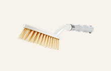 Soft bristle cleaning brush with ergonomic handle used for scrubbing LG washing machine parts	
