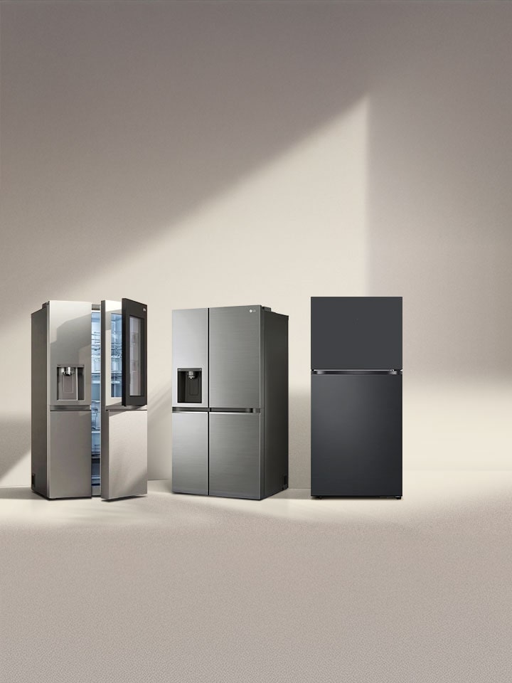 Four LG refrigerator freezers in the sun. Left two-door refrigerator with french door and side-by-side with one-door models next to it.