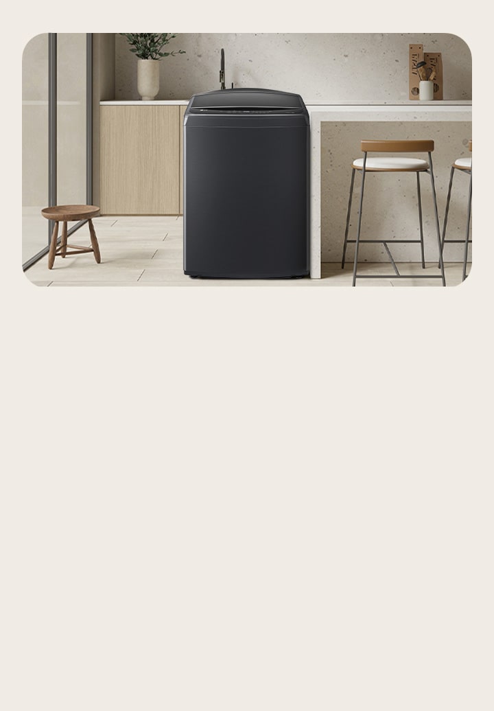 LG Top Load washer in a bright kitchen-style laundry showing easy access and large capacity.