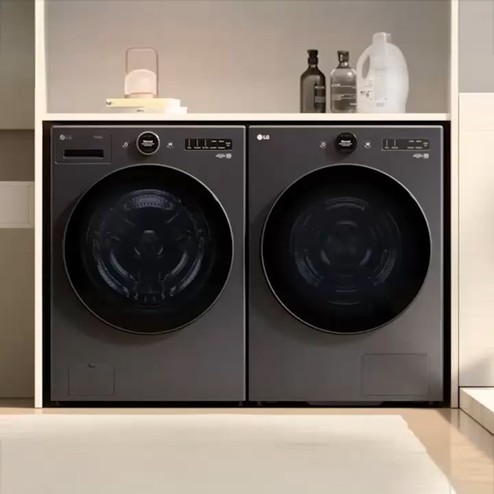 Single all-in-one washer-dryer fitted in a compact laundry cabinet beside shelves, showing space-saving convenience at home.