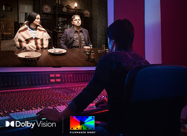 LG TV is shown in a studio as a director works at a control panel while editing a movie displayed on screen. The Dolby Vision and FILMMAKER MODE logos appear at the bottom left.