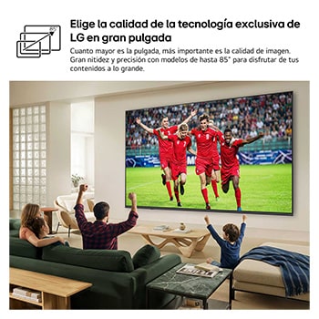 LG QNED evo AI QNED80 Mini LED Ultra Big TV is wall-mounted in a bright living room, showing a soccer celebration with vivid colors and refined picture quality across a wide screen, as a family seated on sofas cheers together.