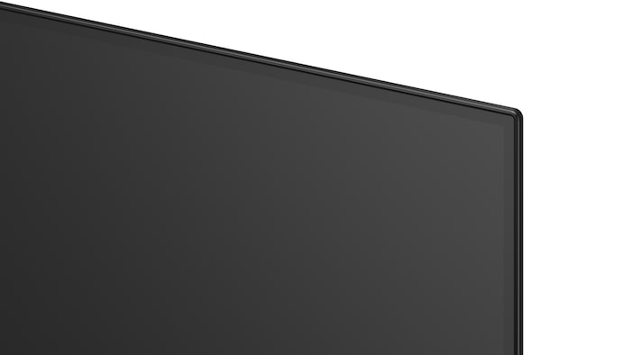 La vue avant de la LG OLED AI B6, lancée en 2026, présente un fin cadre noir, avec une image éclatante et sculpturale de formes multicolores richement superposées remplissant l’écran.