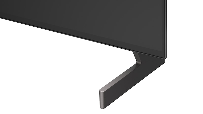 La vue avant de la LG OLED AI B6, lancée en 2026, présente un fin cadre noir, avec une image éclatante et sculpturale de formes multicolores richement superposées remplissant l’écran.
