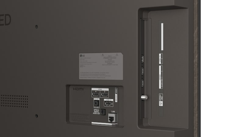 La vue avant de la LG OLED AI B6, lancée en 2026, présente un fin cadre noir, avec une image éclatante et sculpturale de formes multicolores richement superposées remplissant l’écran.