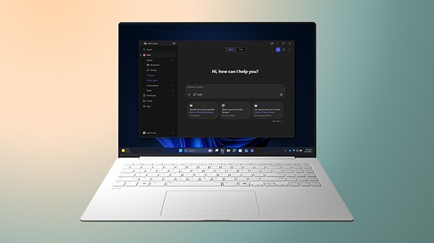 This image shows a laptop displaying a clear Windows 11 screen on a gradient background with a copy of "Upgrade your Efficiency."