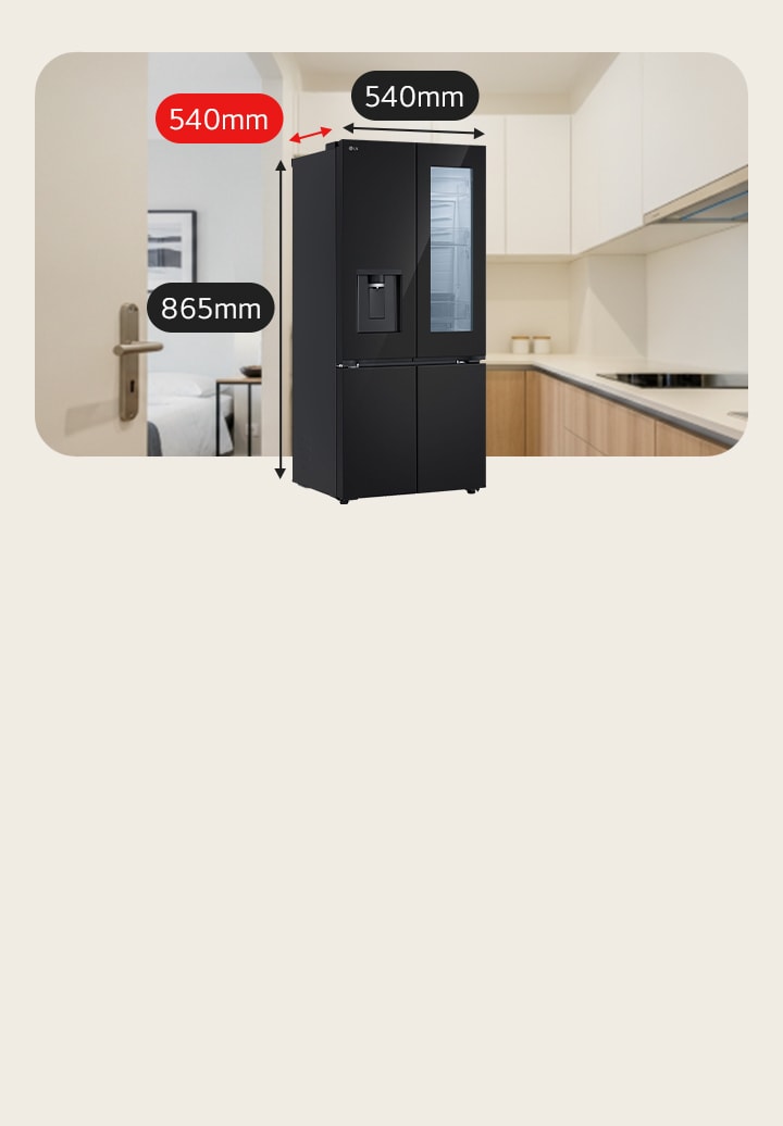Black LG medium-sized fridge freezer with InstaView door and water dispenser. Behind it, a bed is on the left and a kitchen with induction hob on the right.