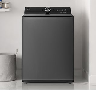 A top-loading washing machine is located in a multi-purpose room with a modern interior on the white floor