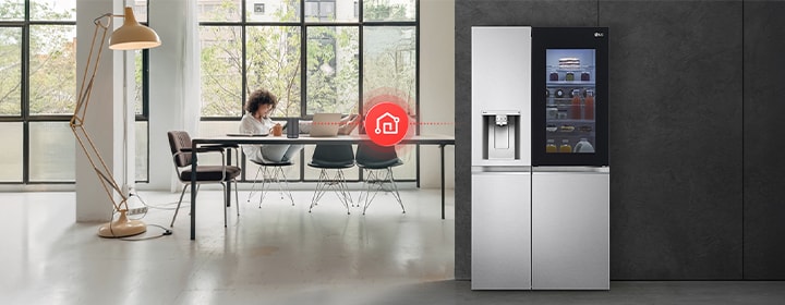 LG fridge freezer connected with smart home control via LG ThinQ app in a modern interior.