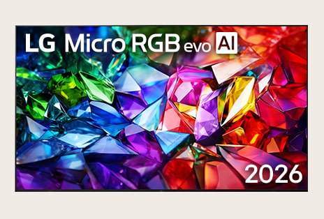 The front view of LG Micro RGB evo AI features a slim black bezel on low-profile feet, with a vivid, crystalline image of sharply defined red, green, and blue facets filling the screen.