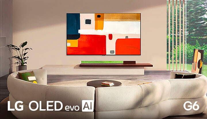 LG OLED evo AI G6 features a Flush-fit Gallery Design mounted seamlessly on the wall in a modern living room, displaying vibrant abstract artwork that complements the sleek interior and bright window-lit space.
