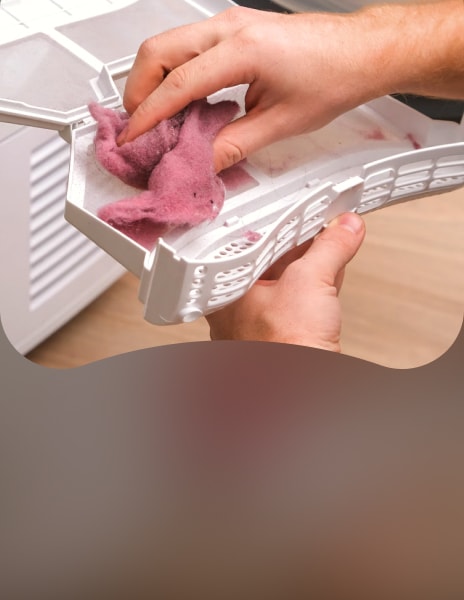 Nettoyage du filtre à peluches du sèche-linge à pompe à chaleur pour un séchage efficace