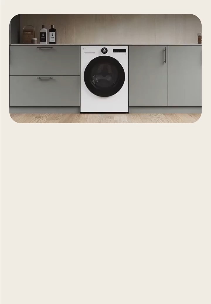 Machine à laver LG à chargement par l’avant installé sous une armoire, affichant un design AI DD™ élégant.