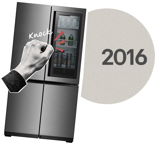 A hand knocking twice on the glass door of the LG InstaView refrigerator.