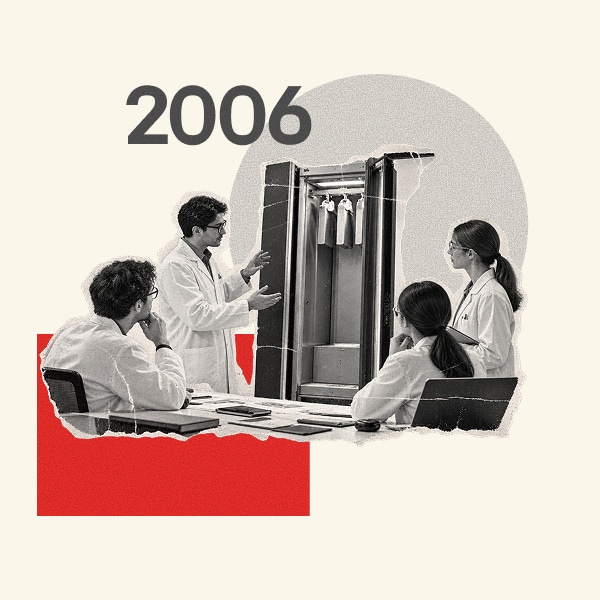 2006, An archival photo of researchers working in a laboratory.