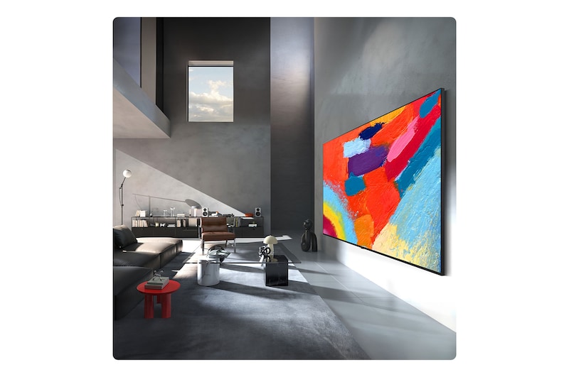 LG Mini RGB evo AI MRGB85 is wall-mounted in a spacious, contemporary living space, displaying a vivid abstract artwork with swirling, multicolored elements.