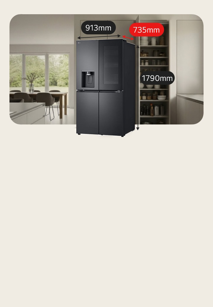 Black LG large capacity fridge freezer with InstaView door and water dispenser. Behind it, a bed is on the left and a kitchen with induction hob on the right.
