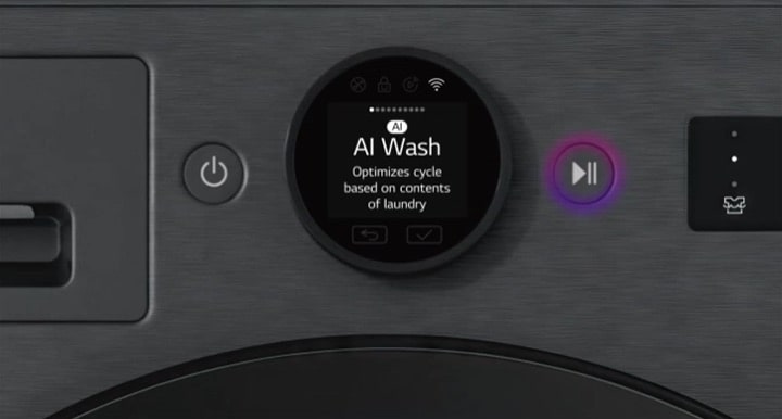 Zooming out from the LG washing machine control panel showing AI Wash mode. Inside the drum, the AI DD chip senses a pink sweatshirt to optimise the wash.