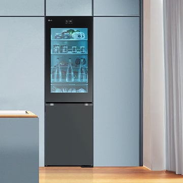 LG bottom-mount refrigerator with a glass InstaView door, offering easy access to fresh food and energy savings in a stylish space.	