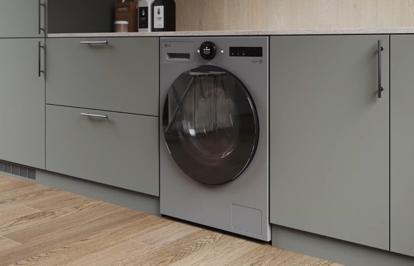 Lavadora LG perfectamente integrada en muebles modernos, incorporada en un elegante espacio de cocina