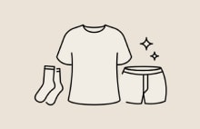 Illustration of T shirt, socks, and shorts representing LG washing machine capacity for single users or couples	