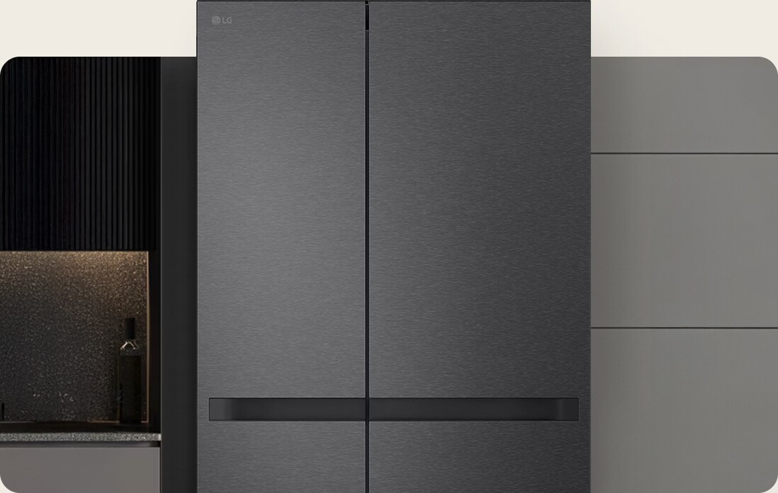 The LG side-by-side fridge freezer close-up with a premium matte black finish integrates seamlessly into a modern kitchen with textured dark cabinets.