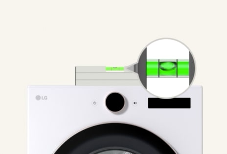 Close up of a adjusting the feet with a bubble level.