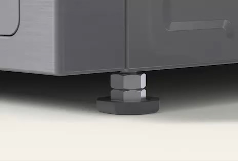 Close-up of LG Washing Machine corner showing the adjustable leg at the base that allows height and level adjustment.