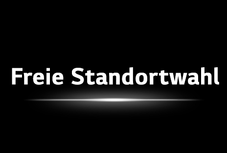 Ein LG True Wireless TV hebt die standortunabhängige Flexibilität mit einer zentrierten Überschrift auf dunklem Hintergrund hervor.