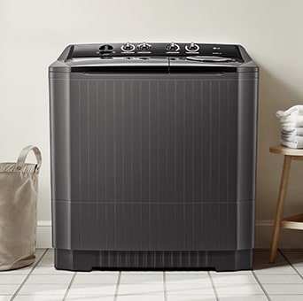 LG Twin Tub washer with wash and spin sections.