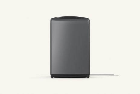 Non pump model washer with the drainage hose positioned above floor level.